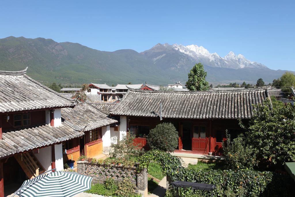 Lijiang Baisha There International Youth Hostel Exterior foto